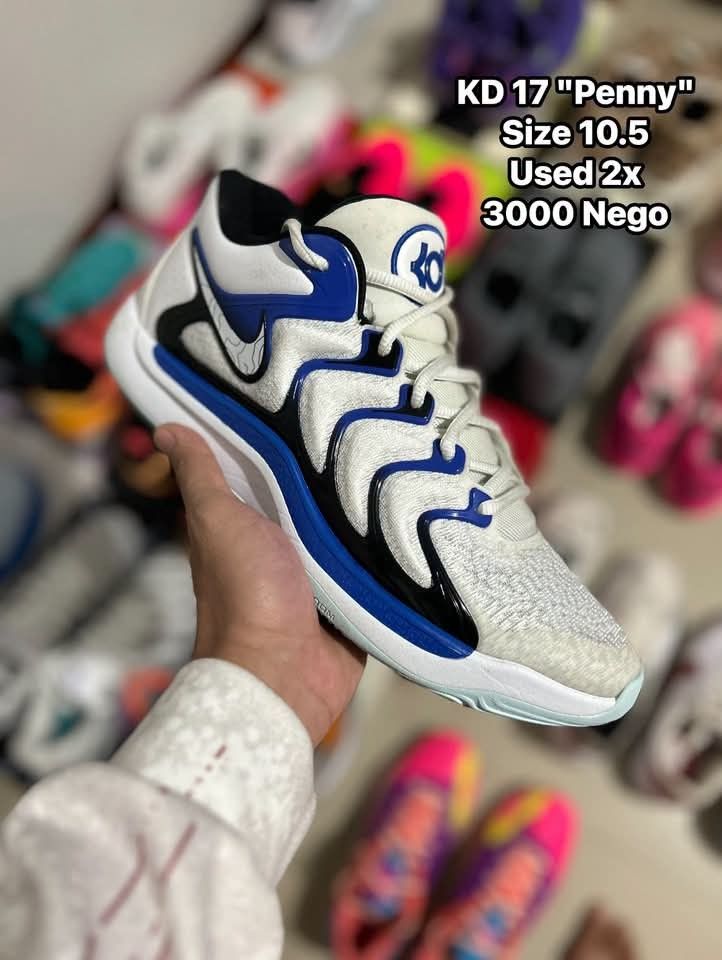 KD 17 Penny (Category: Sneakers) located in Quezon City. Submitted by bertsonamilasolidshoes (Listing ID 1470175506, Image 1). Description: - Brand: Nike - Model: KD 17 Penny Colorway - Size: 10.5 US - Condition: Worn only twice, very clean uppers and soles - Color: Classic blue, black, and white - Features: Great traction, perfect for basketball or casual wear - Availability: Grab them before they're gone!.