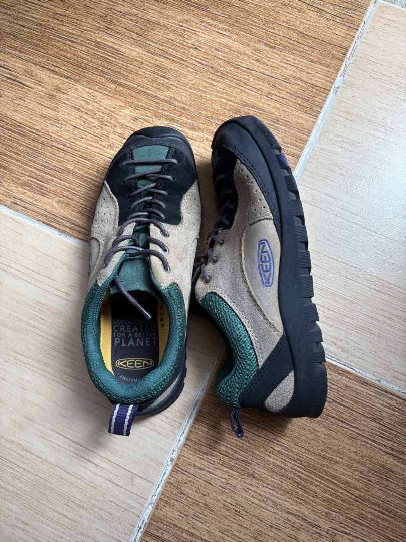 Keen jasper rocks (Category: Sneakers) located in Manila. Submitted by porma.market (Listing ID 1470165916, Image 3). Description: - Brand: KEEN outdoor hiking shoes - Colorway: Beige, black, and green - Size: US 6, UK 3.5, EU 36 / 23Cm - Design: Low-top style with a padded collar, green mesh lining, branded yellow insoles, and dark lace-up closure - Sole: Textured rubber outsole with minimal tread wear - Condition: Clean uppers, very gently used