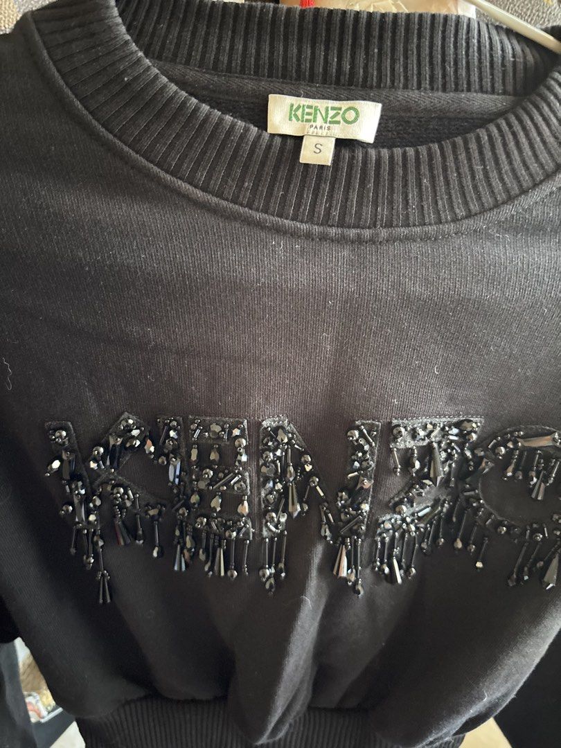 Kenzo (Category: Luxury Apparel) located in Manila. Submitted by kingblaize (Listing ID 1470164076, Image 3). Description: black Kenzo cotton embellished logo sweatshirt featuring beaded and crystal logo detailing across the front, long sleeves, and a ribbed waistband..