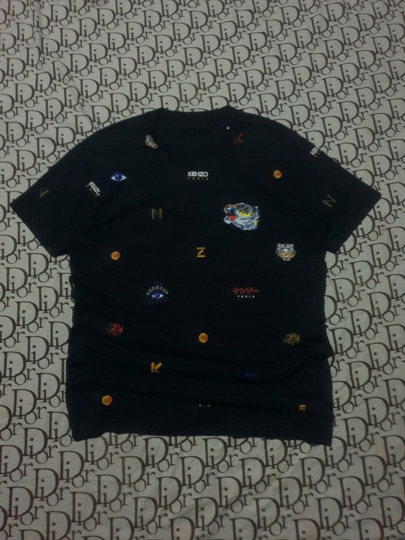 Kenzo AOP tshirt crop top (Category: Shirts) located in San Fernando. Submitted by retro.district. (Listing ID 1470345272, Image 1). Description: - Kenzo AOP top - Size: Medium(19x26) - Condition: Excellent - Issue: missing tags - Color Rate: 9.5/10.