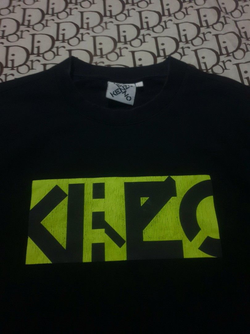 Kenzo Center logo tshirt (Category: Tshirts & Polo Shirts ) located in San Fernando. Submitted by retro.district. (Listing ID 1470345146, Image 2). Description: - Kenzo center logo tshirt - Size: XL(23x28) - Condition: Excellent - Issue: hairlines - Color Rate: 9.5/10.