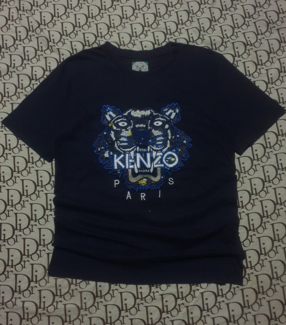 Kenzo tiger embroid (Category: Tshirts & Polo Shirts ) located in San Fernando. Submitted by retro.district. (Listing ID 1470345899, Image 1). Description: - Kenzo tiger embroid - Size: Large (20x28) - Condition: Excellent - No issue - Color Rate: 9.5/10.