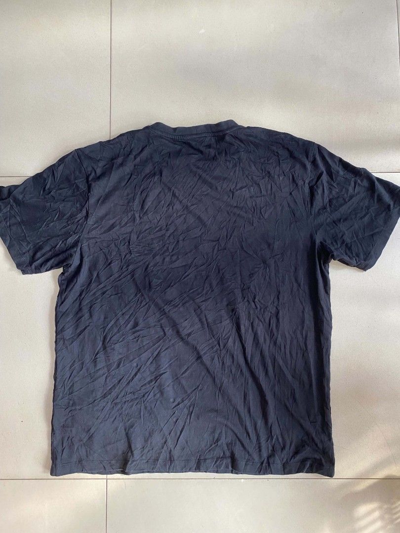 Kenzo Tiger Graphic Black T-Shirt (Category: Tshirts & Polo Shirts ) located in Manila. Submitted by nadyrl (Listing ID 1470307701, Image 3). Description: - Brand: Kenzo - Color: Black - Size: XXL (Relaxed casual fit) - Material: 100% Cotton - Design: Large red and gold tiger graphic print with Paris branding - Neckline: Crew neck - Origin: Made in Portugal - Style Code: F855TS0504Y7.