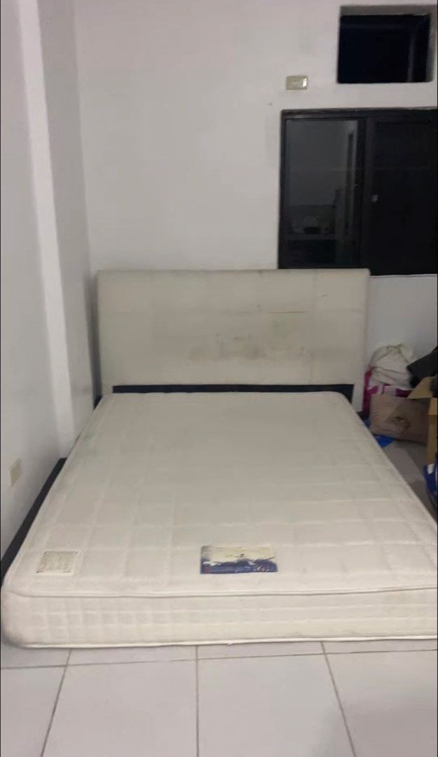 Queen Size Bed and Bed Frame (Category: Bedding & Towels) located in Manila. Submitted by dycluterring_7 (Listing ID 1470348078, Image 1). Description: Spring Mattress - king size from Ambassador Bed (30k orig price) Bed frame - 30k selling for 2,500 heavily used. needs reupholestery and cleaning. Mattress needs to be steamed. Defects: may bali yung isang kahoy ng bed pero usable pa rin. we still use it up to date. Loc: Pasig Note: please bring a