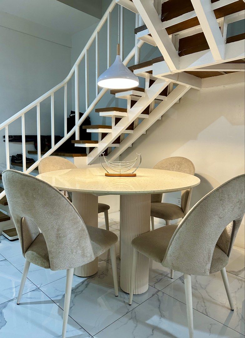 Kinsley 4-Seater Round Dining Set (Category: Tables & Sets) located in Rizal. Submitted by shopwithdikyu (Listing ID 1470175345, Image 2). Description: Kinsley 4-Seater Round Dining Set Pre-loved dining set from Mandaue Foam, perfect for a modern and minimalist home. • 1 round dining table with fluted base • 4 beige upholstered dining chairs • Original price: ₱41,850 • Selling price: ₱33,000 • Condition: Well used 📍 Location: Town & Country Exec