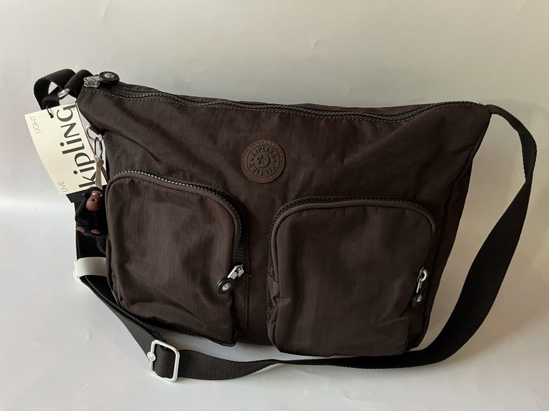 Kipling Sidney Crossbody Bag (Category: Cross-body Bags) located in Santa Rosa. Submitted by ninaparis (Listing ID 1470221770, Image 2). Description: Original Kipling Sidney Crossbody Bag in Nostalgic Brown .