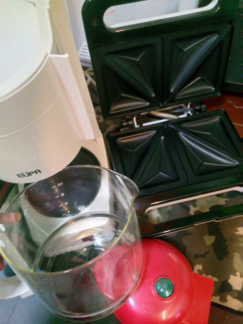 kitchen appliances 3 in 1 (Category: Cookers) located in Manila. Submitted by mjfinds.ph (Listing ID 1470342622, Image 2). Description: ☕🥪 FOR SALE: 3-IN-1 KITCHEN APPLIANCE PACKAGE! 🧇 💰 ₱1,200 — Negotiable! Decluttering sale! Selling these kitchen appliances as a package: ✅ EUPA Coffee Maker ✅ Sandwich Maker ✅ Waffle Maker Perfect for home use and for anyone who loves coffee, sandwiches, and homemade waffles! ❤️ 📌 Selling as a package 📌 Pri