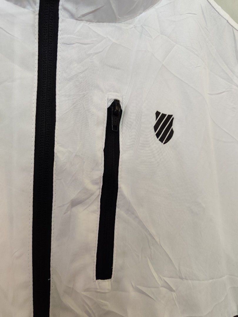 K-Swiss Windbreaker Jacket 🔥 (Category: Coats, Jackets and Outerwear) located in Tabaco. Submitted by thrifttobecool (Listing ID 1470246080, Image 3). Description: Very Good Condition 💯 9.7/10 Color Rate 💯 22 Width 📌 25 Length 📌 M - L ✅ issue: minimal stain ( need wash ) 📌 250 ✅ + sf 📌 Location Bicol ✅.