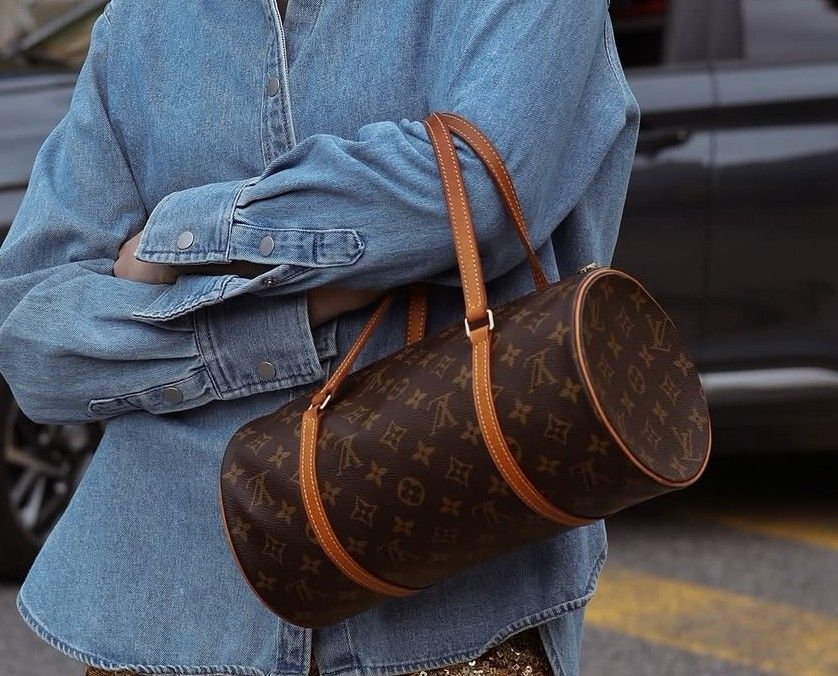 L V Monogram Papillon Cylinder Shoulder Bag (Category: Shoulder Bags) located in Caloocan City. Submitted by mylove326 (Listing ID 1470305741, Image 3). Description: - cylindrical shoulder bag in classic brown monogram canvas - Dual tan leather straps with adjustable buckle attachments - Secure zip top closure with elegant cowhide leather trim - Unique barrel shape offering spacious interior for daily essentials Pm for actual photos .