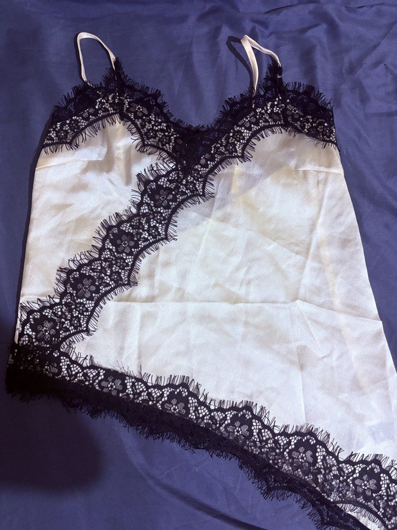 Lace Cami Top (Category: Sleeveless) located in Muntinlupa City. Submitted by emilyyy_s (Listing ID 1470299192, Image 1). Description: Bust - 12 inches Waist - 16 inches Length - 17 & 21 inches Color - Apricot Location: Taguig Rfs: Big for me .