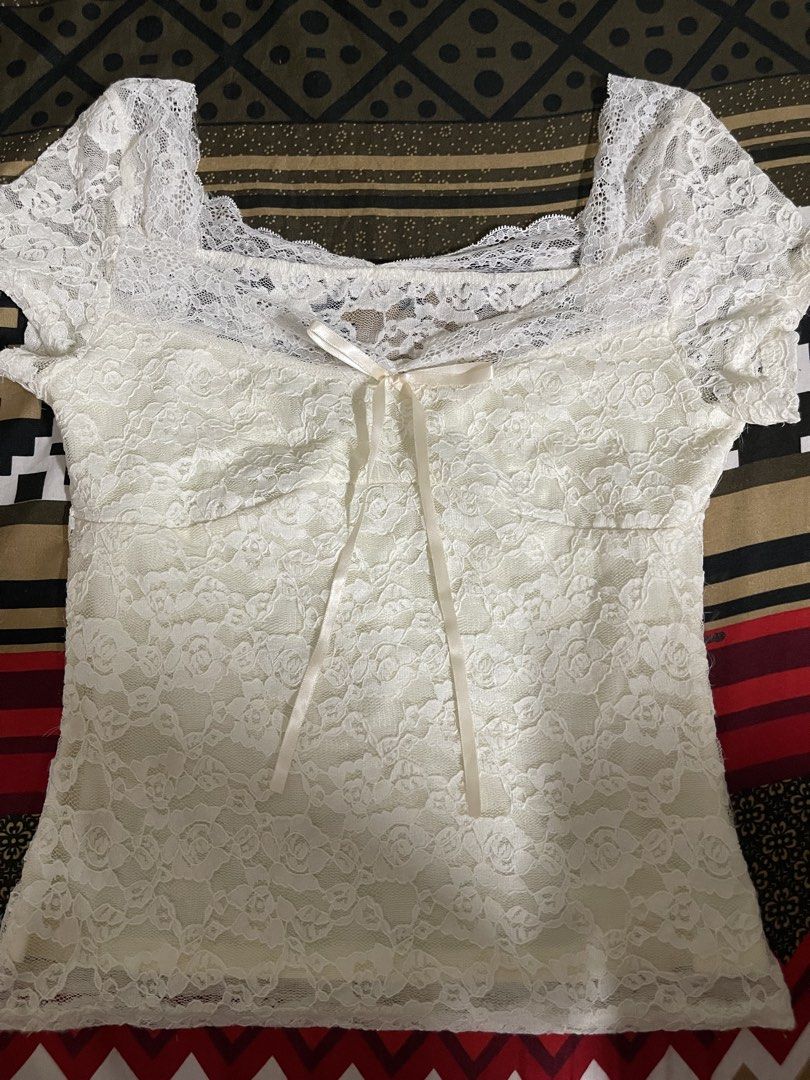 lace top (Category: Others Tops) located in Manila. Submitted by themusecloset (Listing ID 1470252774, Image 2). Description: 🤍🎀 WHITE LACE COQUETTE TOP FOR SALE! 🎀🤍 💸 PRICE: ₱250 ONLY! 📏 SIZE: SMALL (S) 🕊️ Delicate floral lace details 🎀 Cute ribbon tie at the neckline 🤍 Feminine, classy & coquette aesthetic 🌷 Perfect for soft girl OOTDs and date outfits! 🛍️ Available now at Muse Closet 💌 DM to mine! First mine, first served. ♡ #MuseC