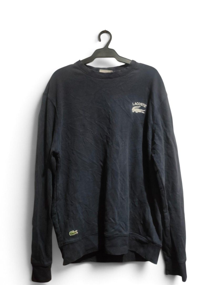 Lacoste big embroidered sweater (Category: Coats, Jackets and Outerwear) located in Daet. Submitted by thriftnidiegz (Listing ID 1470270581, Image 1). Description: excellent condition xl on tag L-28.5 W-22.5.