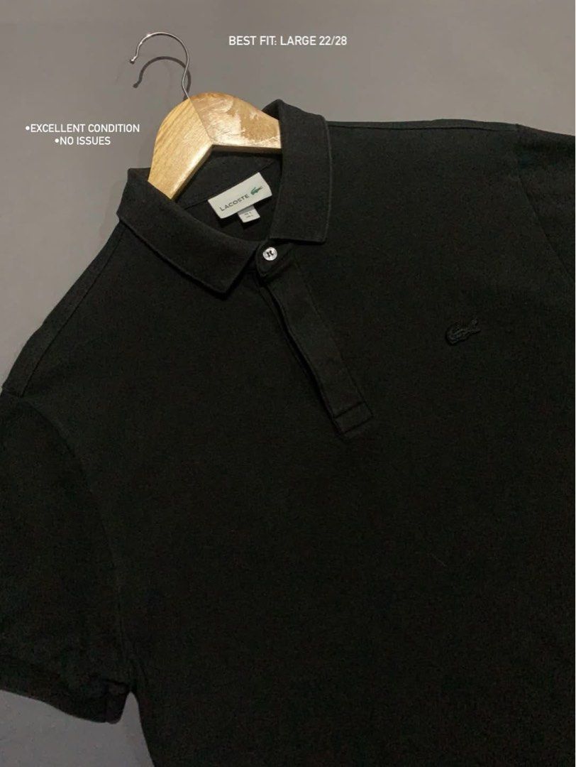 Lacoste Black Polo Shirt (Category: Tshirts & Polo Shirts ) located in Bacacay. Submitted by ukayfindssss (Listing ID 1470144972, Image 1). Description: - Brand: Lacoste - Color: Classic Black - Size: Fits like a Large (22" width x 28" length) - Details: Classic collar with single button placket & embroidered crocodile logo on chest - Condition: Clean fabric, zero flaws, ready to wear.