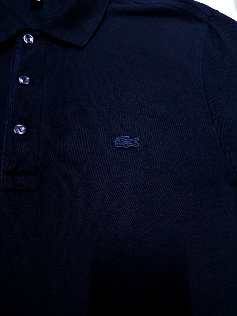 Lacoste Black Polo Shirt PH7937 (Category: Luxury Apparel) located in Quezon City. Submitted by Ms.Givenchy1111 (Listing ID 1470184068, Image 2). Description: Authentic black Lacoste polo shirt in classic cotton piqué. Features short sleeves, a 3-button placket, and the iconic green crocodile logo. Tag style PH7937. Perfect casual wear! dimes - 19x27 cr - 9 no issue - no holes or stain pick up or shipping via jnt frisco qc location.