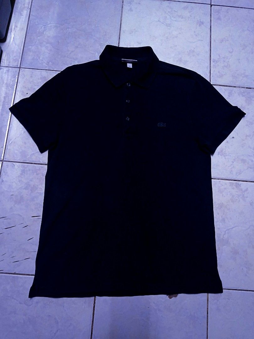 Lacoste Black Polo Shirt PH7937 (Category: Luxury Apparel) located in Quezon City. Submitted by Ms.Givenchy1111 (Listing ID 1470184068, Image 1). Description: Authentic black Lacoste polo shirt in classic cotton piqué. Features short sleeves, a 3-button placket, and the iconic green crocodile logo. Tag style PH7937. Perfect casual wear! dimes - 19x27 cr - 9 no issue - no holes or stain pick up or shipping via jnt frisco qc location.
