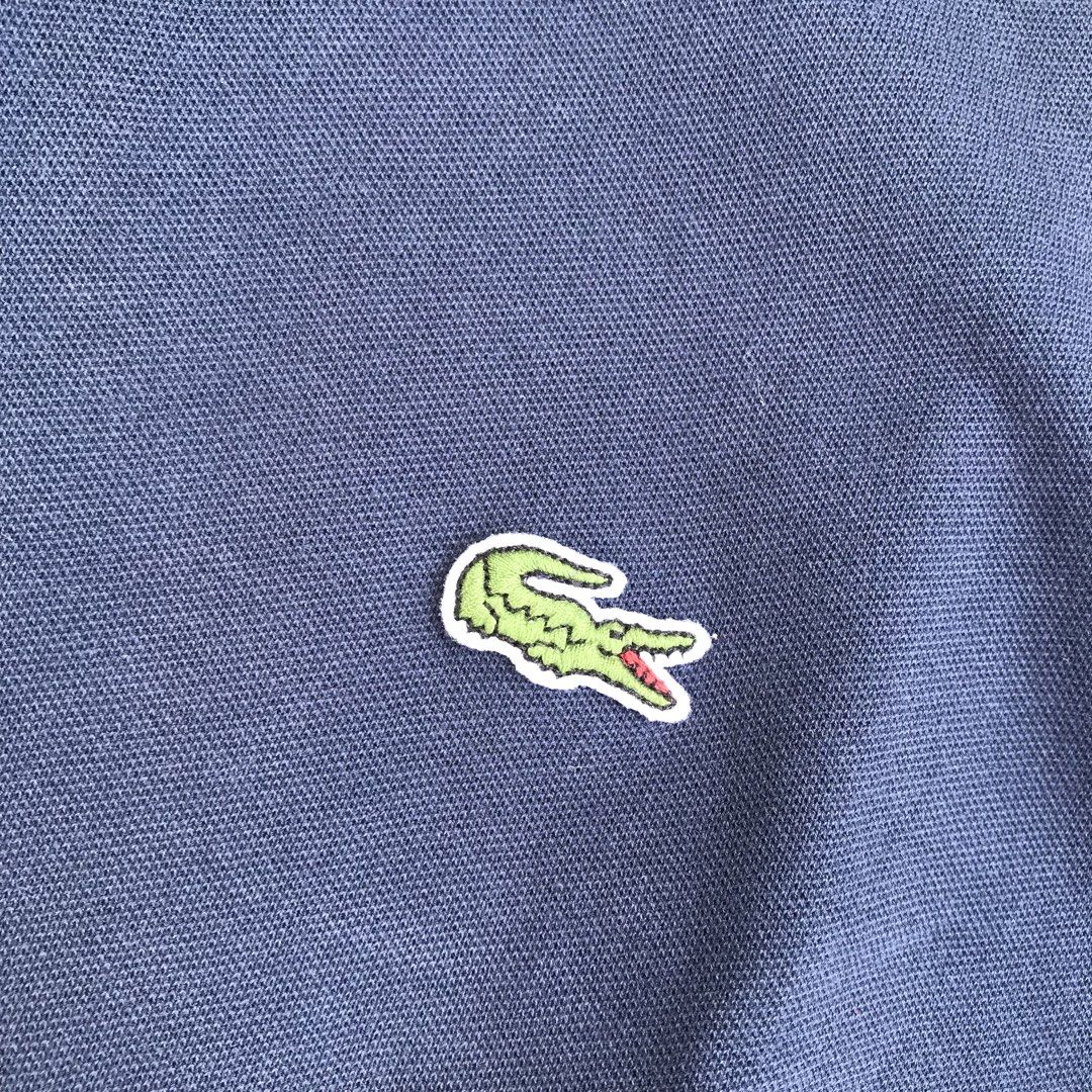 LACOSTE (Contrast-Stripe Polo Shirt) (Category: Tshirts & Polo Shirts ) located in Bulacan. Submitted by xxboutique2428 (Listing ID 1470257391, Image 3). Description: LACOSTE (Contrast-Stripe Polo Shirt) COLOR:NAVY BLUE LOGO:EMBROIDERED WAIST:20 LENGTH:26 COLOR RATE:9.5/10 CONDITION:EXCELLENT NO ISSUE .