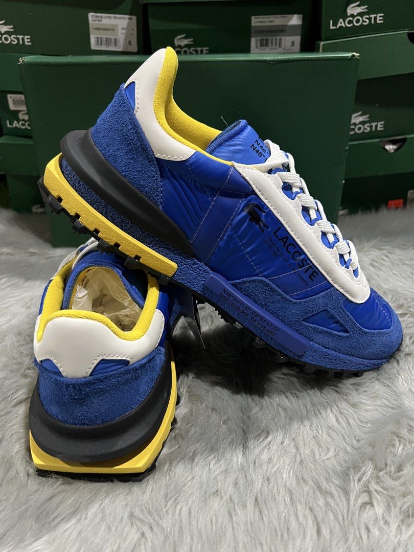 Lacoste Elite Active Shoes Men ORIGINAL (Category: Sneakers) located in Marikina City. Submitted by BunchofBrands (Listing ID 1470194151, Image 2). Description: Men Us 9 and 10 Blue and yellow colorway Brand New with box. Guaranteed Original/Legit 100%. Moneyback if proven fake. Item Onhand 🇵🇭 and ready to ship 🛵..