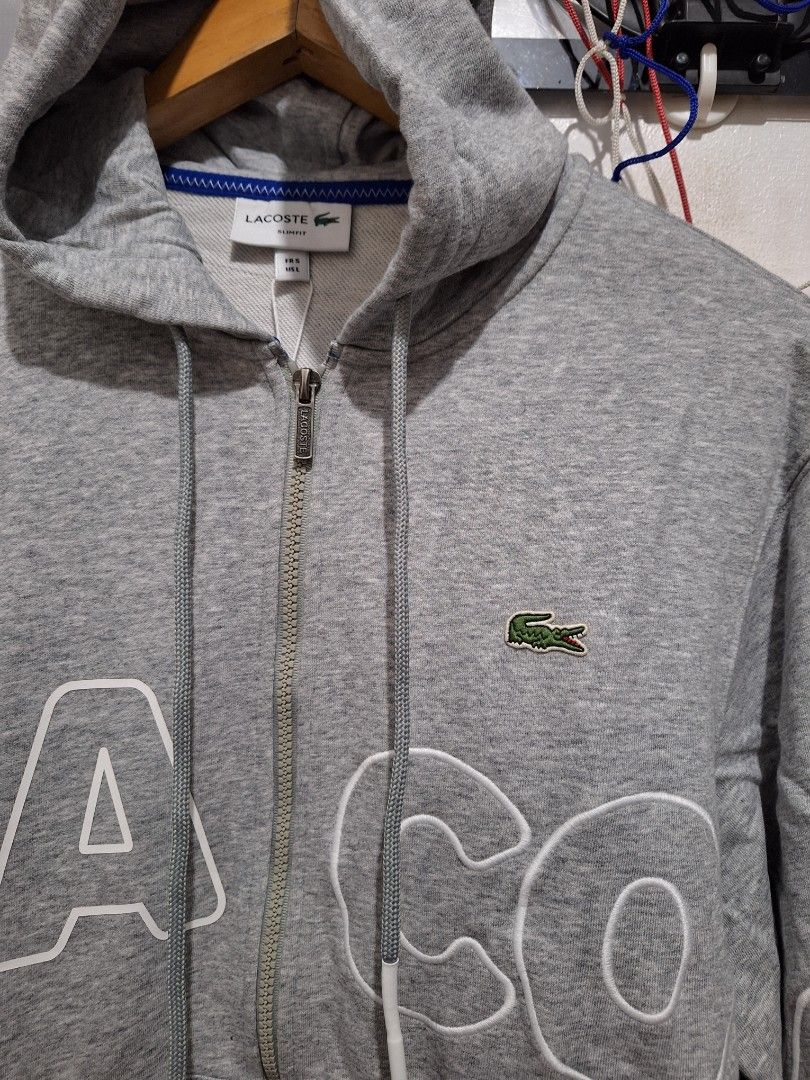 Lacoste jacket large gray spell out (Category: Coats, Jackets and Outerwear) located in Santa Rosa. Submitted by pat0317 (Listing ID 1470299845, Image 2). Description: lacoste spellout logo gray full zip hoodie jacket brandnew no issue large - 22 x 26.5 cod cop lalamove lbc j&t.