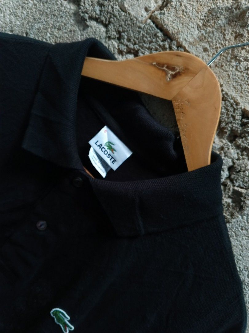 Lacoste Polo shirt (Category: Tshirts & Polo Shirts ) located in Bantayan. Submitted by adrianharr61925 (Listing ID 1470173743, Image 2). Description: 28 length 22 width may dumi lang sa may collar peor hindi stain removable excellent condition color rate 10/10.