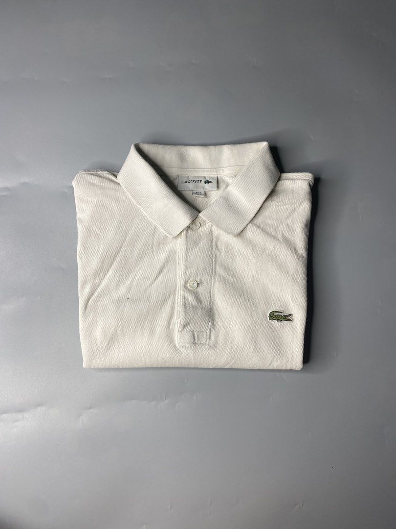 Lacoste Polo Shirt (dirty white) (Category: Tshirts & Polo Shirts ) located in Bago City. Submitted by jg_finds_ (Listing ID 1470226968, Image 1). Description: size Large on tag Width- 20.5 inch Length- 27 inch Authentic Excellent Issue:broken hem chain stitch.