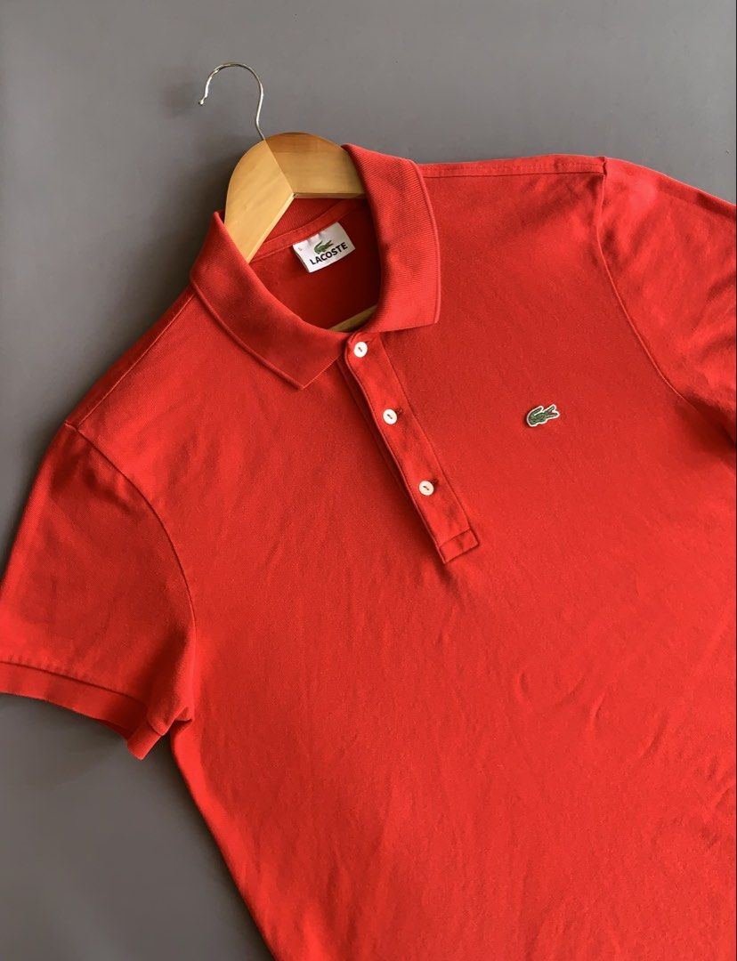 Lacoste Red Polo Shirt Size 5 Medium (Category: Tshirts & Polo Shirts ) located in Bacacay. Submitted by ukayfindssss (Listing ID 1470145270, Image 2). Description: - Brand: Lacoste - Color: Vibrant Red - Condition: Pristine, zero issues, ready to wear - Size: Fits like Medium (approx. 20" x 27") - Material: Comfortable cotton blend with slight stretch - Details: Classic collar, 3-button placket, iconic embroidered green crocodile logo on chest.