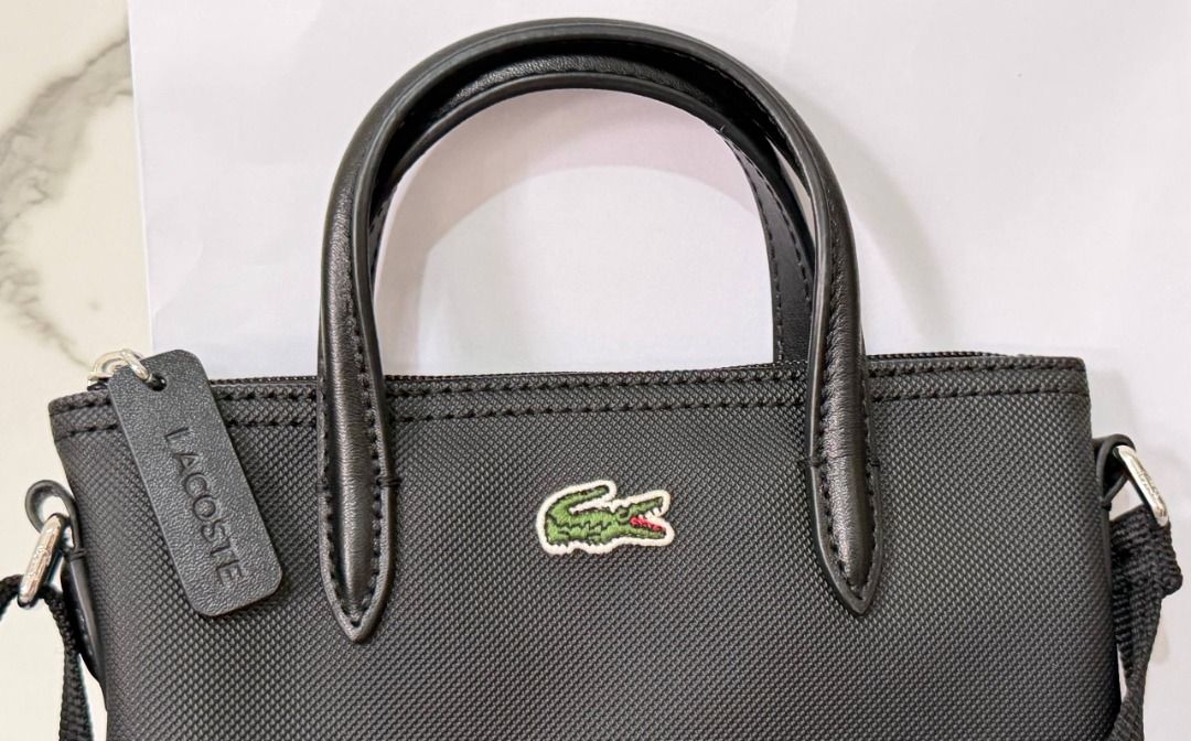LACOSTE sling bag original (Category: Cross-body Bags) located in Floridablanca. Submitted by declutterwithmeee.218 (Listing ID 1470184380, Image 3). Description: .