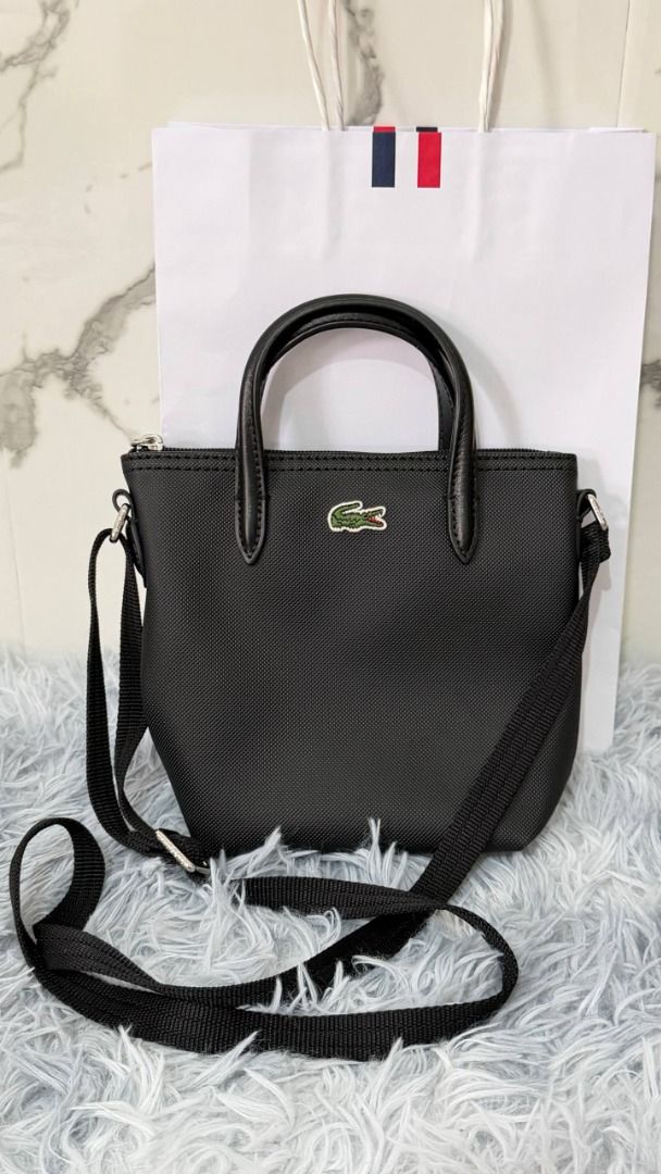 LACOSTE sling bag original (Category: Cross-body Bags) located in Floridablanca. Submitted by declutterwithmeee.218 (Listing ID 1470184380, Image 1). Description: .