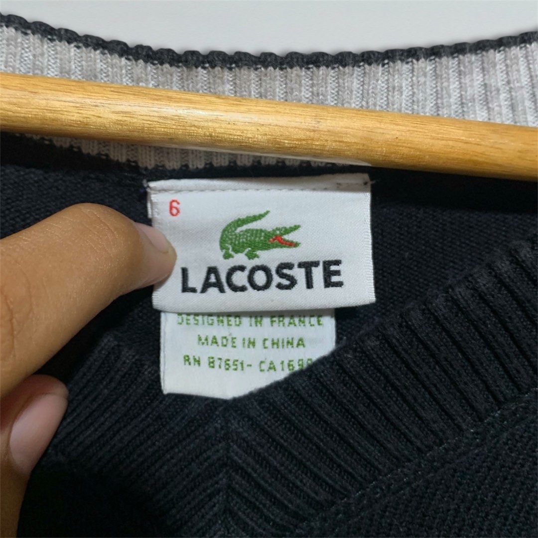 Lacoste V Neck Knit Sweater (Category: Coats, Jackets and Outerwear) located in Taguig. Submitted by thrift_langsheesh (Listing ID 1470175293, Image 3). Description: Size:Large Dimes:21x29 Issue:None Color Rate:9/10 or better.