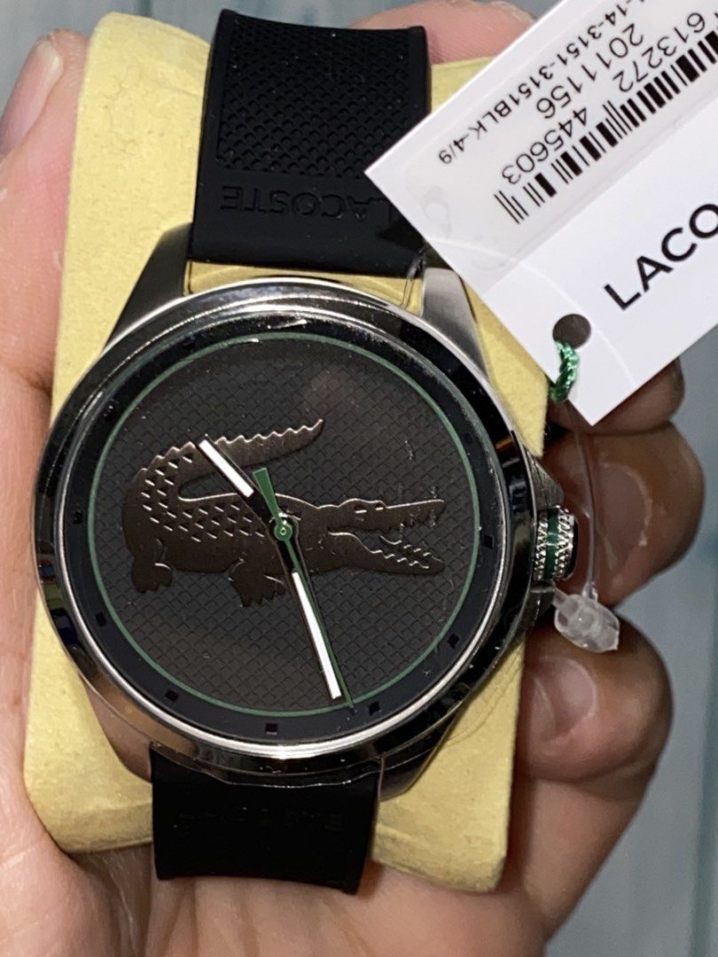 Lacoste Watch Model 2011156 Black Silicone Strap (Category: Men's Watches) located in Makati City. Submitted by newdolphin.ef022f (Listing ID 1470346361, Image 3). Description: - 100% Authentic Lacoste Watch (Model: 2011156) - Brand new, unused, and carefully stored in its original packaging - Features a comfortable black silicone strap and textured black dial - Stylish silver case accented with a signature green second hand - Large, iconic croco