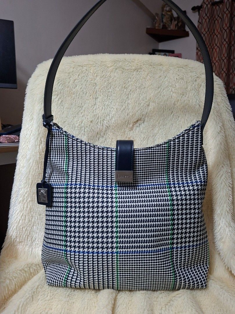 Lauren Ralph Lauren Houndstooth Pattern Shoulder Bag (Category: Luxury Bags & Wallets) located in Manila. Submitted by yanakolekzione (Listing ID 1470319333, Image 1). Description: - original Lauren Ralph Lauren - Style: Shoulder bag - Pattern: Black and white houndstooth with blue and green accent lines - Material & Trim: Solid dark navy leather strap and trim accents - Hardware: Metal plaque with LAUREN branding on the front flap strap and a ma