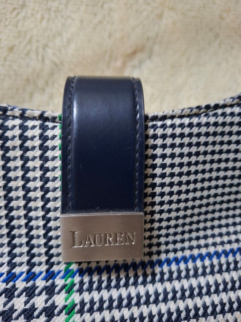 Lauren Ralph Lauren Houndstooth Pattern Shoulder Bag (Category: Luxury Bags & Wallets) located in Manila. Submitted by yanakolekzione (Listing ID 1470319333, Image 3). Description: - original Lauren Ralph Lauren - Style: Shoulder bag - Pattern: Black and white houndstooth with blue and green accent lines - Material & Trim: Solid dark navy leather strap and trim accents - Hardware: Metal plaque with LAUREN branding on the front flap strap and a ma