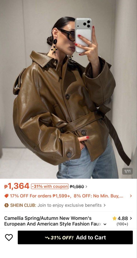 Leather Trench Jacket Brown (Category: Coats, Jackets and Outerwear) located in Cebu City. Submitted by prelovedandnewones (Listing ID 1470167277, Image 1). Description: - Brand: Camellia - Material: Brown faux leather - Fit: Oversized with large structured shoulders - Closure: Button front with a matching tie belt at the waist - Details: Wide lapels and belted cuffs - Season: Ideal layering piece for autumn and spring.
