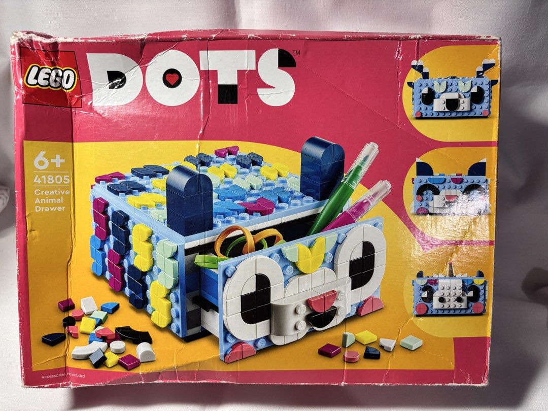 LEGO DOTS Creative Animal Drawer 41805 (Category: Lego & Building Sets) located in Baguio. Submitted by 21enygrace.ph (Listing ID 1470276508, Image 1). Description: - LEGO DOTS Creative Animal Drawer (Set 41805) - Recommended for ages 6 and up - Factory sealed bags inside original box (box has minor shelf wear and edge creases) - Includes original instruction booklet - Fun and functional DIY project for organizing small desk items.