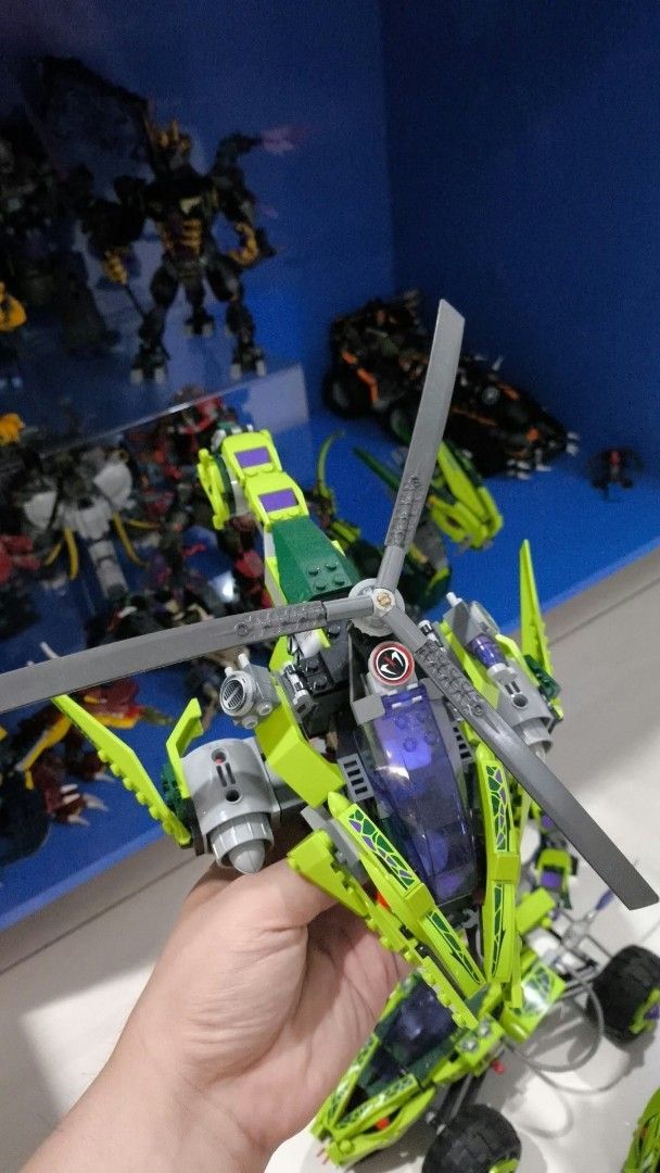 LEGO Fangpyre Crawler and Scorpion Vehicles Bundle (Category: Lego & Building Sets) located in San Isidro, Davao Oriental. Submitted by johnantung6969 (Listing ID 1470344592, Image 3). Description: - LEGO Ninjago snake theme bundle - Includes green Venomari vehicle with scorpion tail - Comes with a crane vehicle and wrecking ball attachment - Features various custom builds and extra lime green and black bricks - Clean and carefully stored pieces,