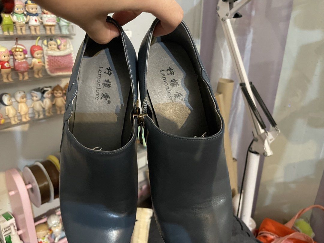 Lemonlove Blue Pointed Toe Heeled Boots (Category: Boots) located in Pasig City. Submitted by raeraesold333 (Listing ID 1470307359, Image 3). Description: - Brand: Lemonlove - Color: Dark blue - Design: Pointed toe with trendy woven side panel detailing - Heel: Stable chunky block heel for comfort - Closure: Convenient side zipper - Finish: Clean leather-look SIZE fits size 7 (38).