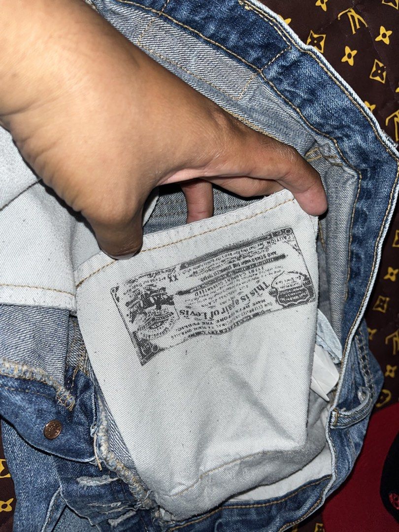 Levi's 501 Button-Fly Jeans (Category: Jeans) located in Manila. Submitted by becarria_thrift23 (Listing ID 1470250182, Image 3). Description: Features the iconic leather back patch, red tab, and printed pocket lining. Ship na sa 1k.