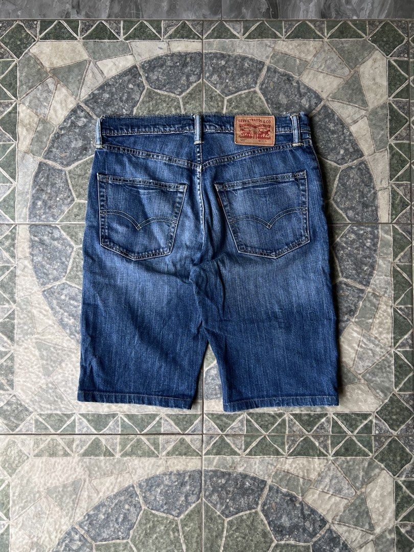 Levi’s 502 (Category: Shorts) located in Daraga. Submitted by palm.garments (Listing ID 1470271581, Image 3). Description: Authentic Tagged size: 31 Condition: 10/10 Fabric: 100% cotton Made in: Vietnam Dimensions: Width: 32” Length: 21” Hem: 9 Dm!.