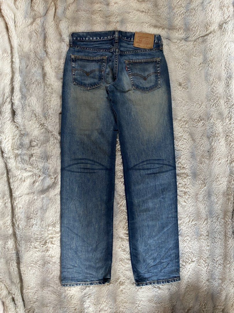 Levi's 599 Jeans Size 28x32 (Category: Jeans) located in Andop. Submitted by safewater-895a (Listing ID 1470280755, Image 2). Description: - Brand/Model: Levi's 599 Denim Jeans - Wash/Color: Medium wash with natural fading patterns on front and back thighs - Fit: Straight leg cut - Size: 28 waist / 32 length (based on patch label) - Details: Classic five-pocket design, leather back patch, and signature red tab - Condition: Excellent pre-loved con
