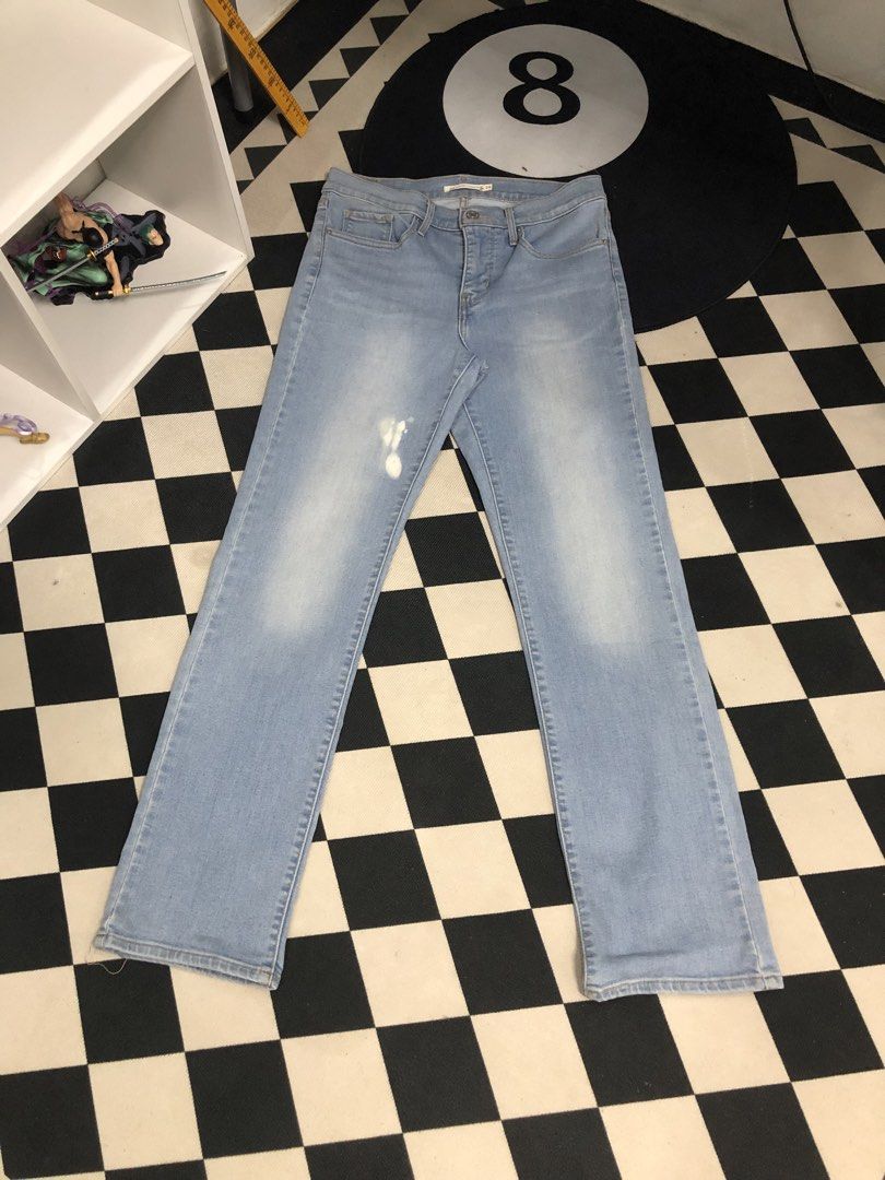 Levi's Pants Washed Denim Dimes: 30X30 (Category: Jeans) located in Manila. Submitted by ejaay_2012 (Listing ID 1470348176, Image 2). Description: - Brand/Model: Levi's 314 Shaping Straight Jeans - Wash: Light blue - Size: 28 - Details: Classic button and zip fly, belt loops, 5-pocket styling, and back leather patch - Flaws: Noticeable bleach/paint stain on the front right thigh and loose threads at the hem seam - Condition: Pre-loved with flaws,