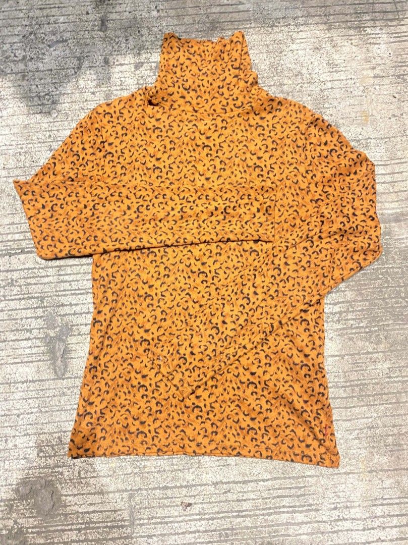 LEVI'S RUST LEOPARD TURTLE NECK LONG SLEEVE SWEATER (Category: Activewear) located in Mandaue City. Submitted by gusstboy21 (Listing ID 1470292878, Image 1). Description: AUTHENTHIC NO ISSUE SIZE : MED ON TAG DIMES : W30 L22.5 MOP : GCASH MOD : JNT LOC : CEBU, PH + SF.