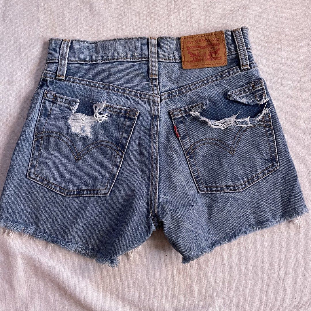 Levi's Wedgie Short Distressed Denim (Category: Shorts) located in Santa Rosa. Submitted by jamrose (Listing ID 1470231049, Image 3). Description: - Brand: Levi's Wedgie Short - Size: 24 - Wash: Light denim wash - Fit: High-rise, super flattering - Closure: Button fly.