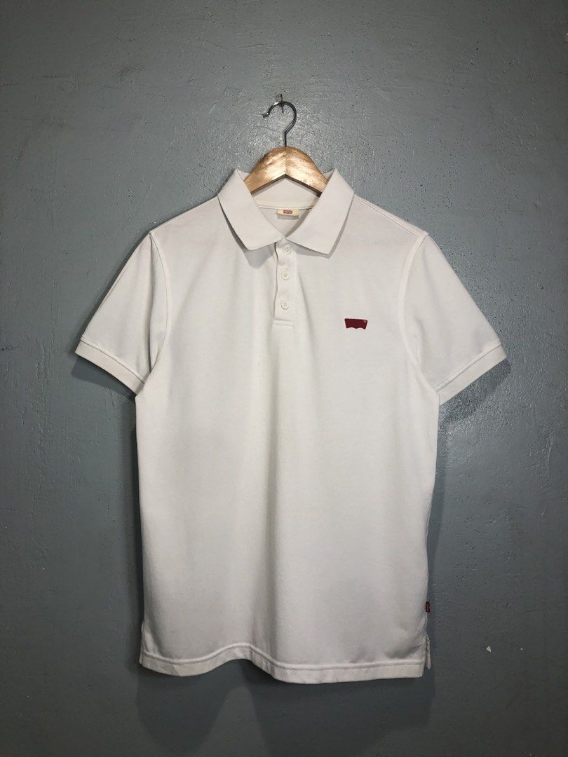Levi's White Polo Shirt Size L (Category: Tshirts & Polo Shirts ) located in Bacong. Submitted by crommermann (Listing ID 1470295682, Image 1). Description: Levis Polo Shirt 🏷️ + 90 shipping fee -Dimes Width 21 Length 28 -Condition 9.5/10 -Color Rate 9.5/10 Good Condition Color may vary due to lightning Very Presentable when Worn Need Wash Pm/Dm Visayas Dumaguete loc J&T Courier Express 🚛🚛🚛.