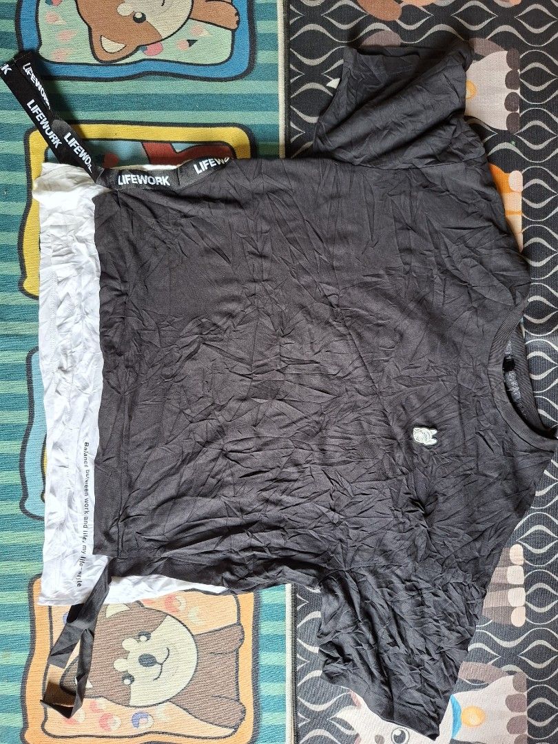 LifeWork Black Layered T-Shirt (Category: Shirts) located in San Francisco. Submitted by manu2025 (Listing ID 1470142370, Image 1). Description: - Color: Black with layered white hem - Fit: Free size, oversized fit - Details: Branded ribbon ties on both sides, French bulldog logo patch on chest, text print on back neckline - Mode of Payment: GCash, Bank Transfer - Shipping: Fast shipping via J&T or Flash Express.