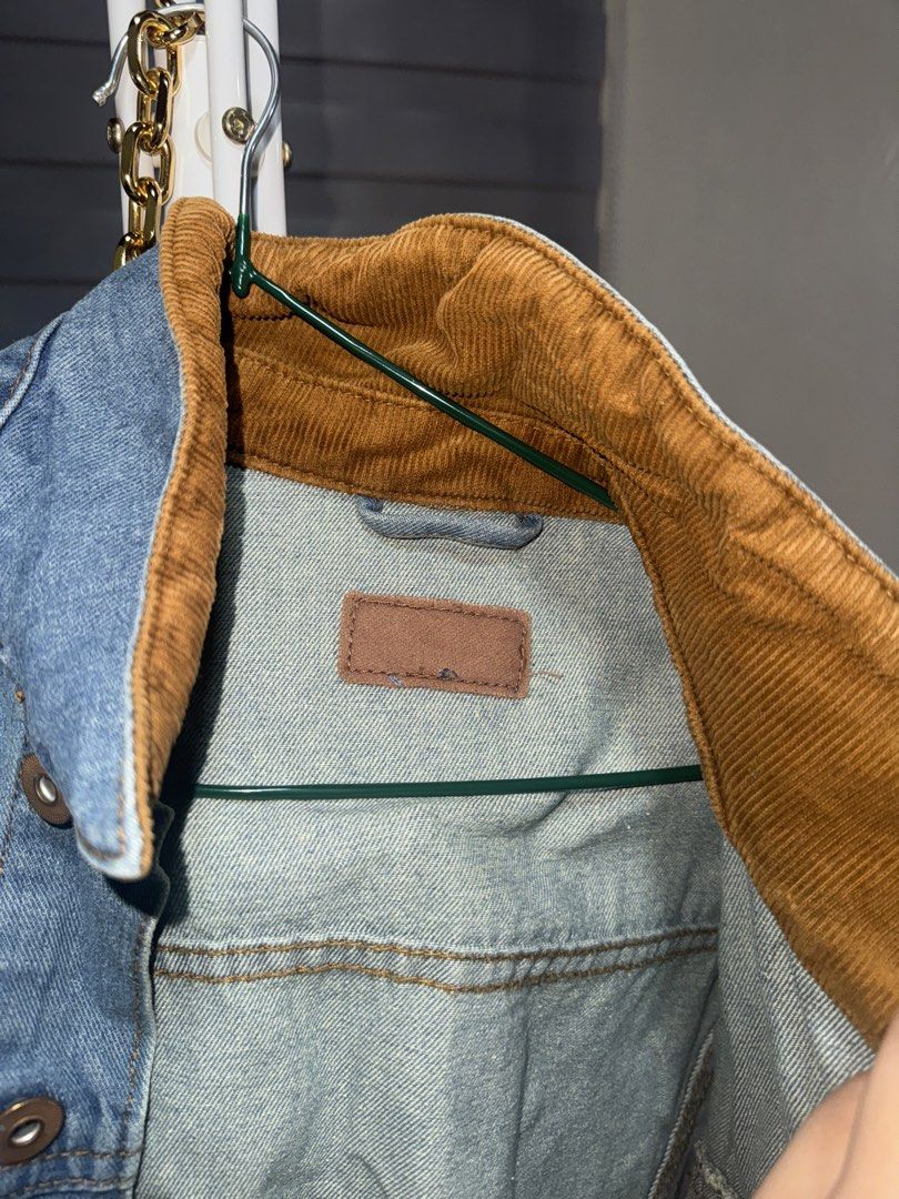 Light blue denim jacket with brown corduroy collar (Category: Coats, Jackets and Outerwear) located in La Trinidad. Submitted by prelovedandfindsbyji (Listing ID 1470285689, Image 2). Description: - Light wash denim jacket with stylish brown corduroy collar - Button-up front closure - Features functional chest pockets and side pockets - Classic fit designed for easy layering over t-shirts and hoodies - Great wardrobe staple for cooler weather.