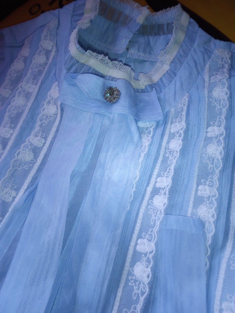 LIGHT BLUE VINTAGE LACE BLOUSE 🩵 (Category: Longsleeves) located in Manila. Submitted by fabelz (Listing ID 1470180130, Image 3). Description: 🩵 LIGHT BLUE VINTAGE LACE BLOUSE 🩵 💰 Price:₱200 (negotiable) ୨ৎ Details • Color: Light blue • Size: Small to Medium (S-M) • Style: Vintage-inspired blouse with delicate white lace details • Sleeves: Long sleeves with buttoned cuffs • Condition: Never worn 🩵 A pretty, vintage-inspired blouse with delic