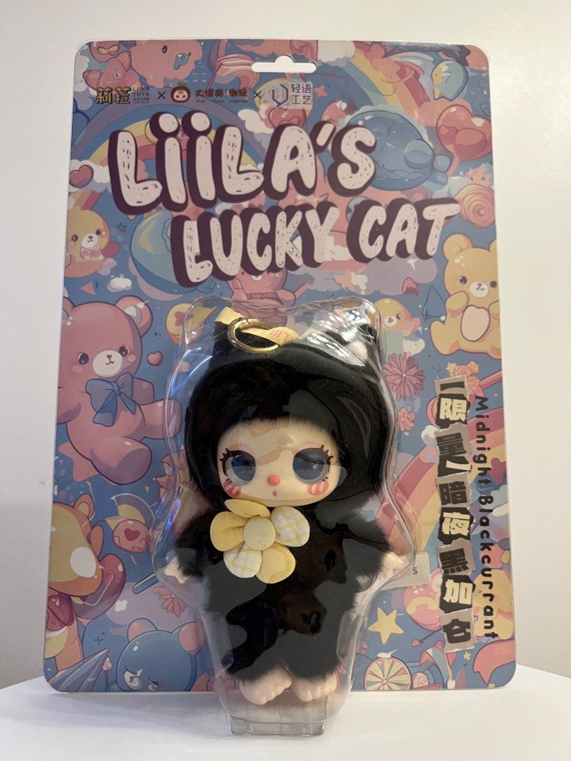 Liila's Lucky Cat Midnight Blackcurrant Plush (Category: Designer & Blind Box Toys) located in Rizal. Submitted by plushiegiftsandtoys (Listing ID 1470300831, Image 1). Description: Liila's Lucky Cat - Midnight Blackcurrant Edition (Special) Brand new. The backing card is in great shape, though there is a minor dent on the plastic blister cover from storage. This does not affect the plush inside..