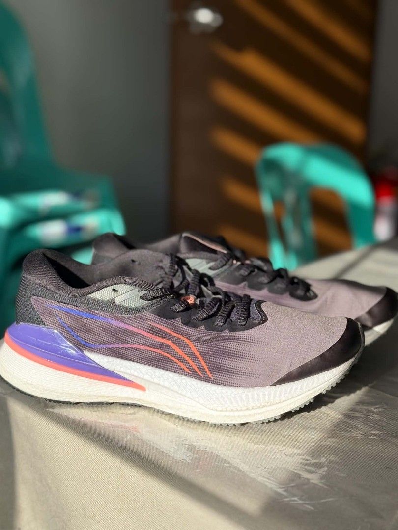 Li-Ning Running/Training Shoes (Category: Sneakers) located in Las Pinas. Submitted by my4ww (Listing ID 1470335446, Image 1). Description: - Brand: Li-ning Running Shoes - Colorway: Black with vibrant purple and orange gradient accents - Closure: Traditional lace-up - Condition: Good as new / Excellent quality RARELY USE NEGOTIABLE, drop offers - Mode of Payment: GCash, Maribank, or COD via Lalamove - Shipping: Ships nationwide via J&T Express (