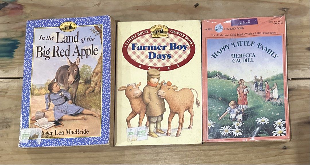 Little House Books BUNDLE (Category: Children's Books) located in Caloocan City. Submitted by mae2551 (Listing ID 1470271384, Image 1). Description: - Product: Little House Books Bundle with Happy Little Family - Condition: Minor shelf wear on covers and edges Selling as a bundle of three for 180php. Included: - In the Land of the Big Red Apple by Roger Lea MacBride - Farmer Boy Days by Laura Ingalls Wilder - Happy Little Family by Rebecca Caudil