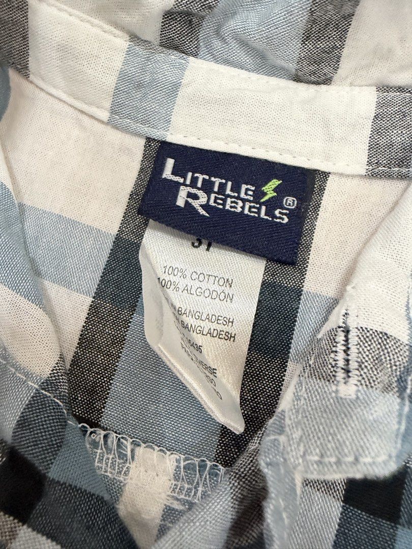 Little Rebels Blue Plaid Button-Down Shirt Size 3T (Category: Babies & Kids Fashion) located in Taguig. Submitted by jesellek (Listing ID 1470204514, Image 2). Description: - Brand/Style: Little Rebels plaid button-down shirt - Colorway: Blue, black, and white - Size: Toddler 3T - Material: 100% cotton (machine washable) - Features: Long sleeves, button front, and single chest pocket - Perfect for everyday wear, easy to match with jeans or chinos