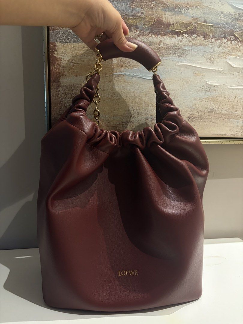 Loewe Squeeze Bag (Category: Shoulder Bags) located in Cabanatuan. Submitted by ldej20 (Listing ID 1470254888, Image 1). Description: From an Australian Balikbayan Box 🇦🇺 BAG DETAILS & CONDITION: • Loewe Squeeze Bag • Chic, slouchy design • Ruched handle with signature chain detail • Pre-loved condition (please refer to actual photos) • What you see is what you get IMPORTANT DISCLAIMER: ⚠️ Authenticity is NOT guaranteed. ⚠️ No authenticity card